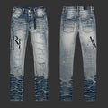 Amiri Distressed Logo Skinny Jeans (Light Blue)